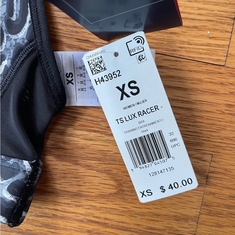 NEW Reebok TS Lux Racerback Sports Bra Leopard Black Size XS NWT